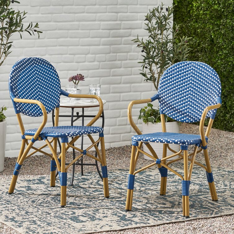 Blue rattan best sale dining chairs